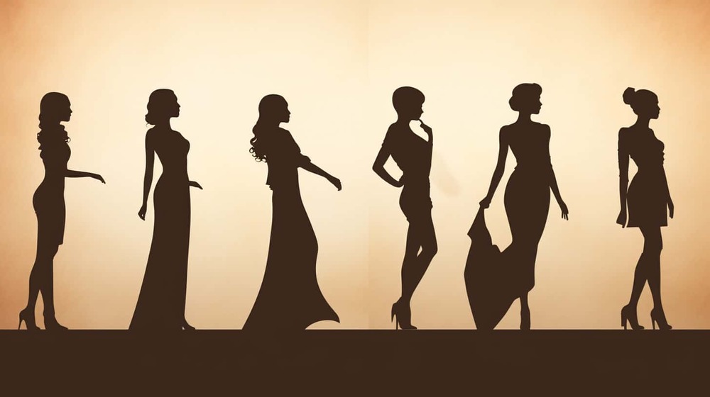 female silhouettes agains a cream colored background